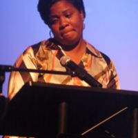 SR- 22c-Melody Simms reading a piece.JPG